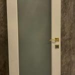 Porta Scorrevole Laminato Capitolino con Vetro